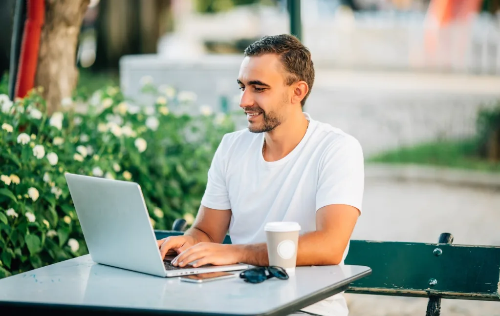 A long-term investor reviewing a portfolio outdoors