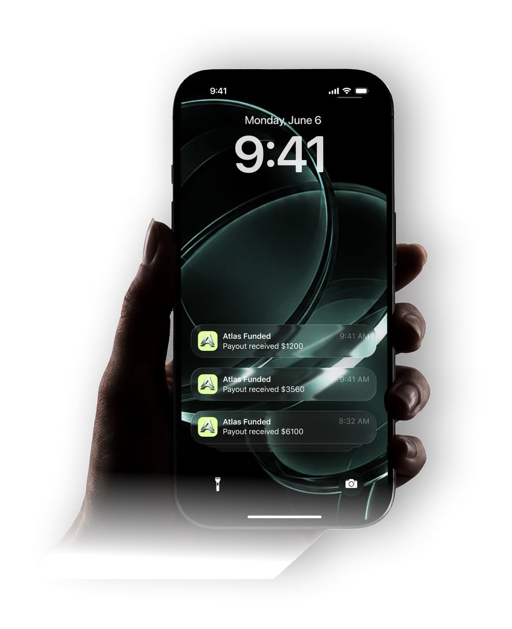 A phone lock screen showing three Atlas Funded payout notifications.