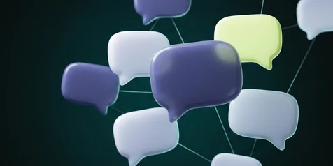 Speech bubbles floating in dark space, one lit in lime